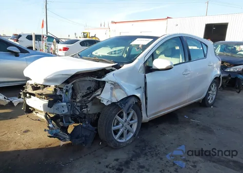 2015 Toyota Prius C One from USA, damaged, VIN JTDKDTB36F1584137